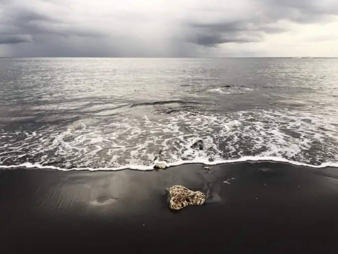 Volcanic black sand beach in Amed, Bali.