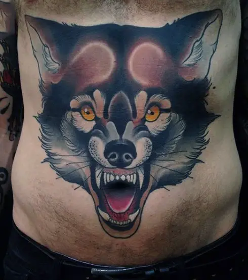 big-wolf-face-tattoo-on-mans-stomach