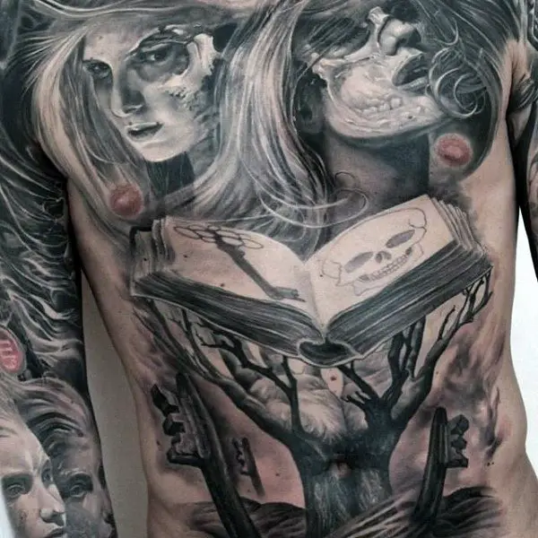 demon-book-upper-stomach-tattoo-for-guys-with-trees
