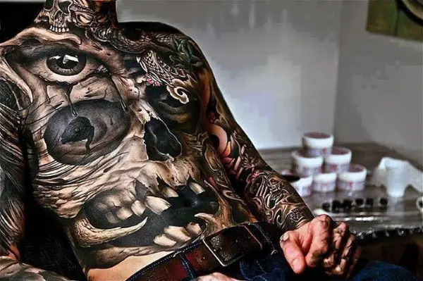 full-skull-manly-stomach-tattoos-for-men-in-black-ink