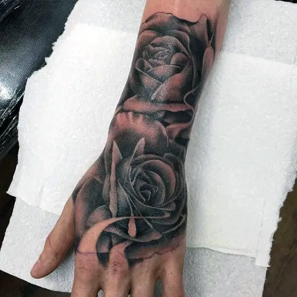 mens-flower-hand-tattoos