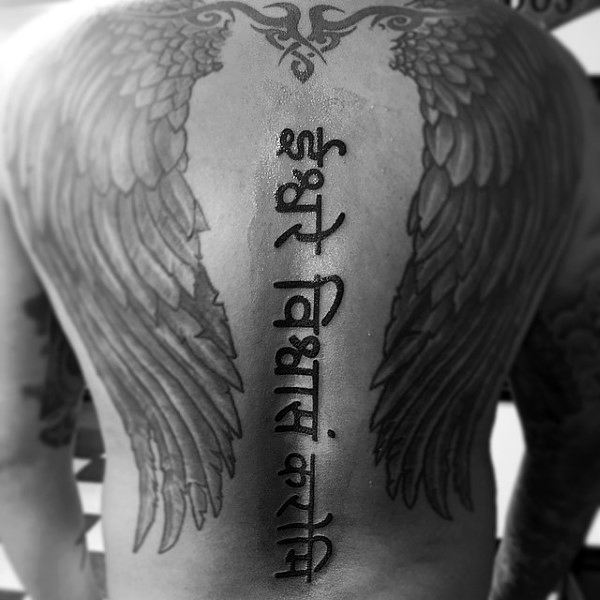 mens-lettering-spine-tattoo-with-angel-wings-on-back
