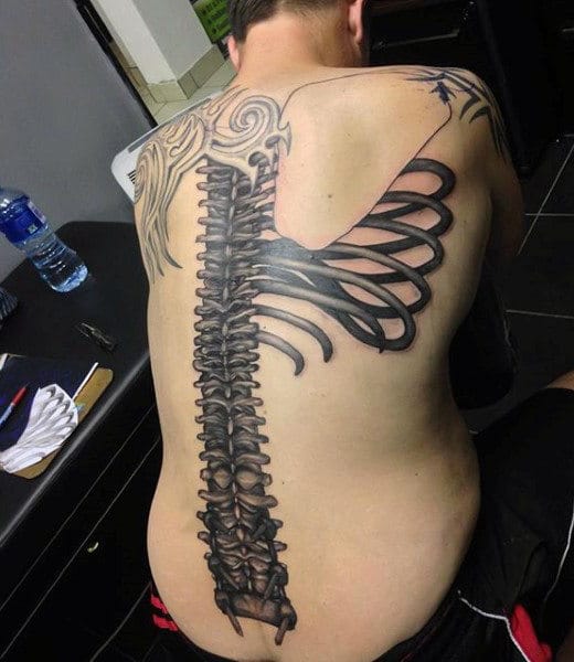 mens-middle-of-back-spine-bone-tattoo-design
