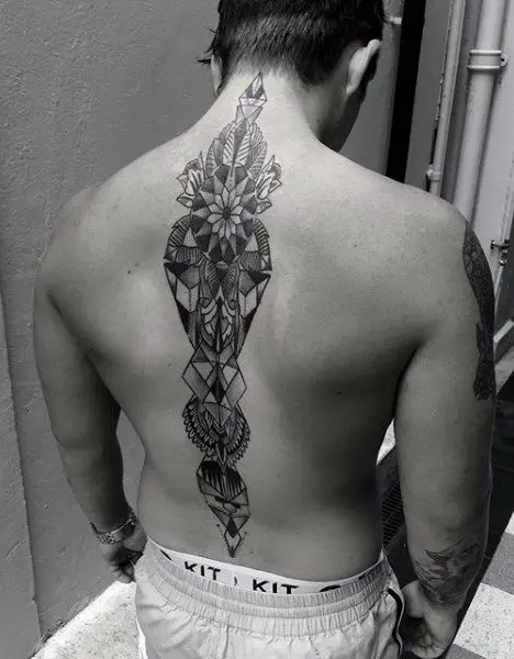 traditional-geometric-spine-male-tattoo