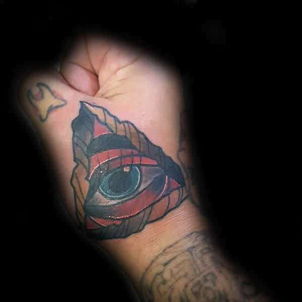 all-seeing-eye-arrowhead-guys-traditional-hand-tattoo