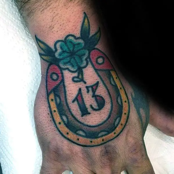 mens-hand-traditional-horseshoe-lucky-number-13-tattoo
