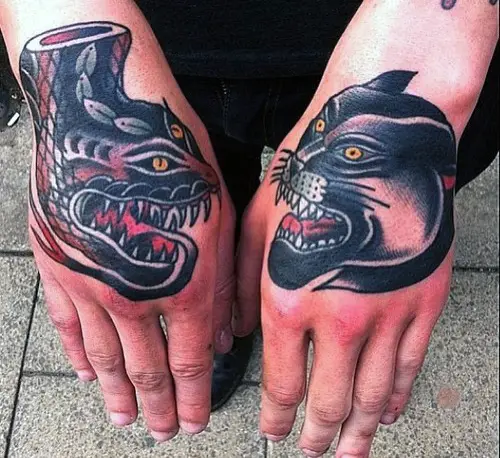 old-school-snake-with-panther-traditional-male-hand-tattoos