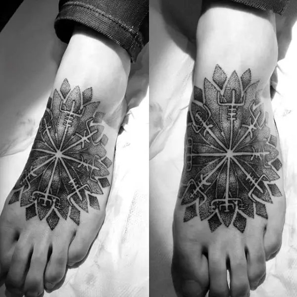 black-and-grey-tribal-design-foot-tattoo-for-male