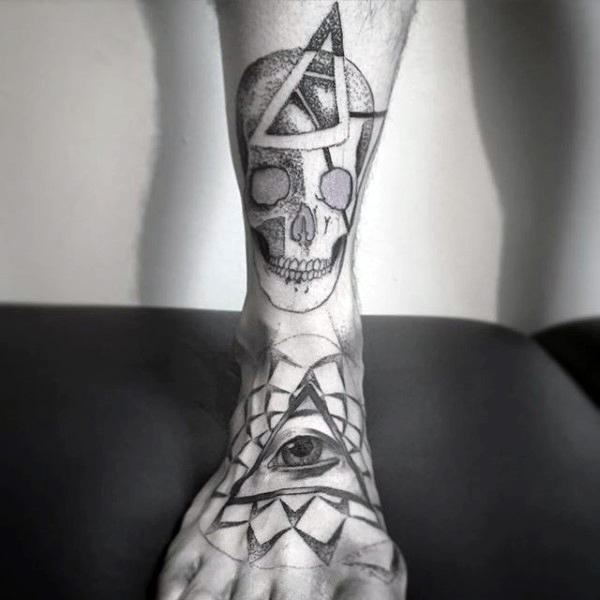 eye-inside-triangle-and-skull-tattoo-mens-foot