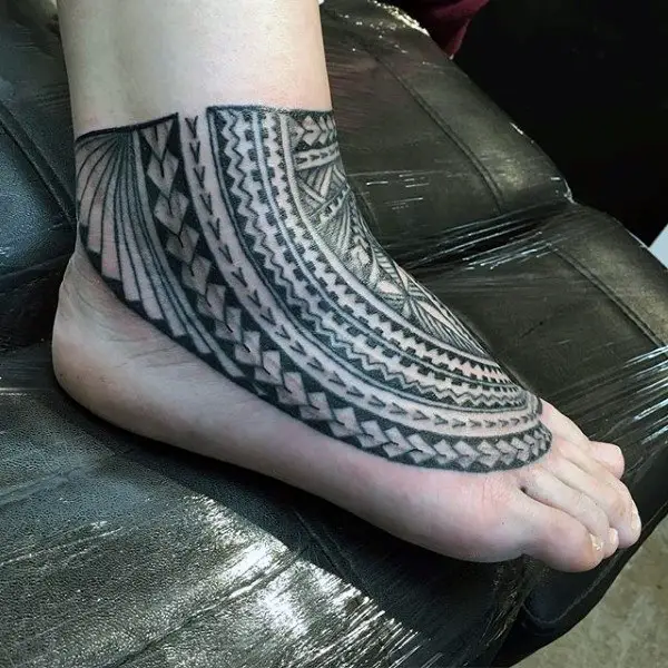 geometric-pattern-black-design-tattoo-on-foot-for-guys