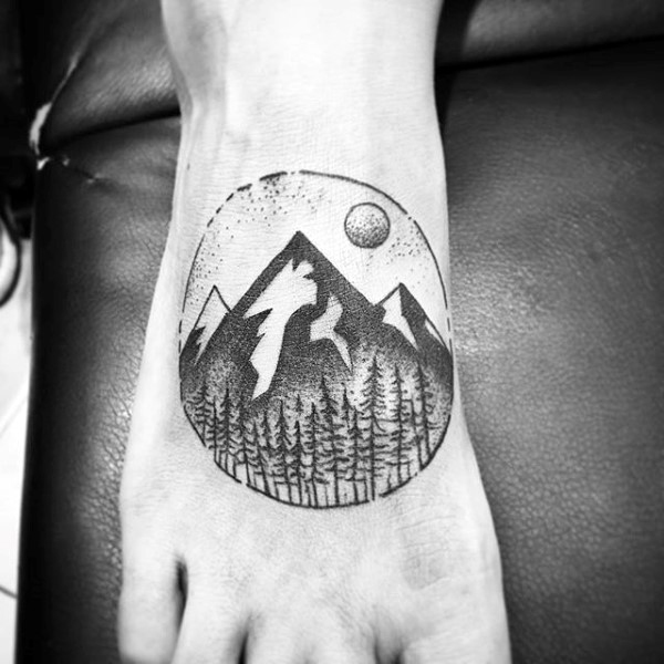 mens-circular-stamp-grey-dotted-foot-tattoo