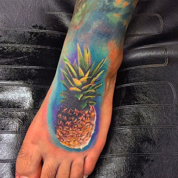 mens-colorful-pineapple-tattoo-on-foot