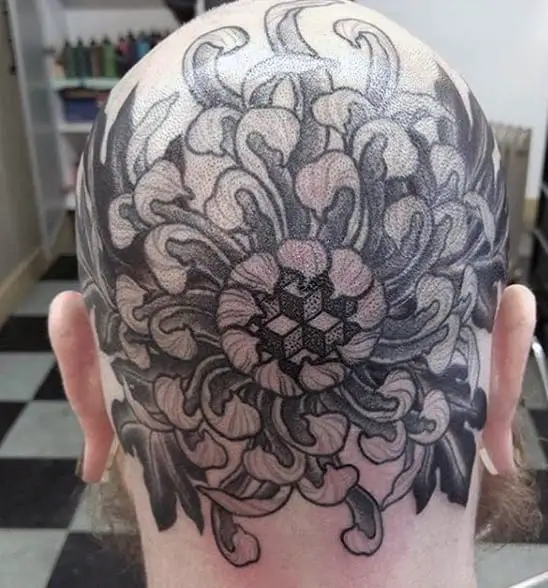 floral-male-head-tattoo-with-geometric-center