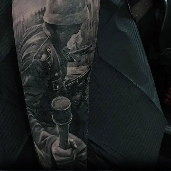 gentleman-with-hyper-realistic-war-sleeve-tattoo