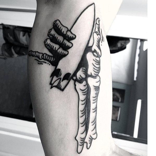guy-with-cool-skeleton-hand-surf-board-small-unique-inner-arm-tattoos