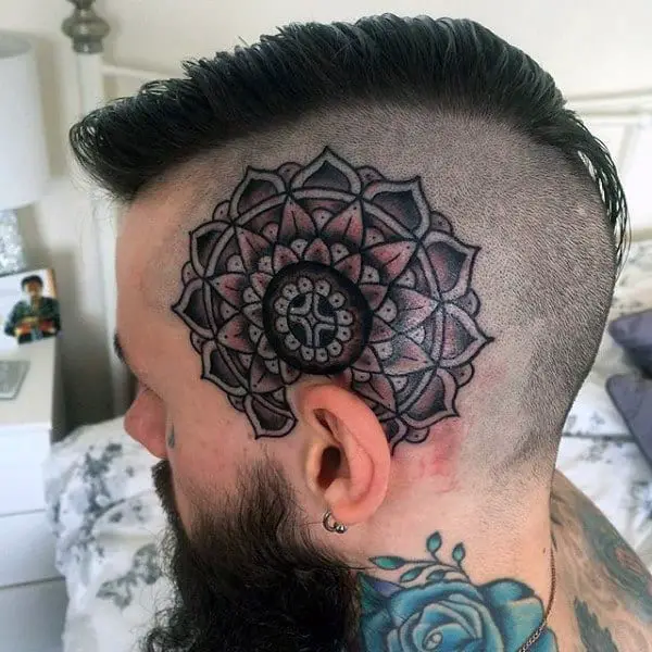 head-tattoo-of-geometric-flower-on-male