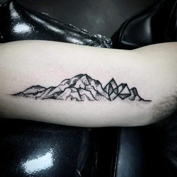 inner-arm-bicep-mountains-small-unique-tattoos-for-guys