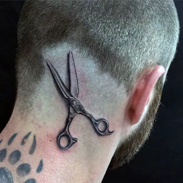 man-with-realistic-scissors-head-tattoo