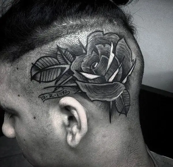 man-with-rose-flower-head-tattoo