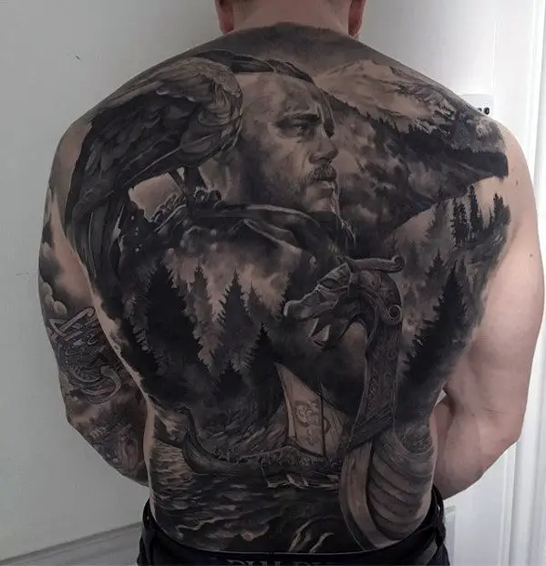 viking-warrior-with-nature-forest-mens-badass-back-tattoo