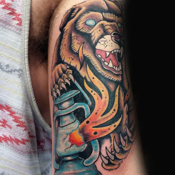 bear-holding-lantern-on-file-mens-upper-arm-tattoos