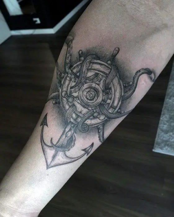 guys-ship-wheel-anchor-unqiue-tattoos-on-inner-forearm