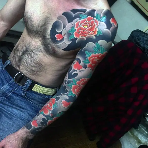 male-with-japanese-carnation-flower-full-sleeve-tattoo