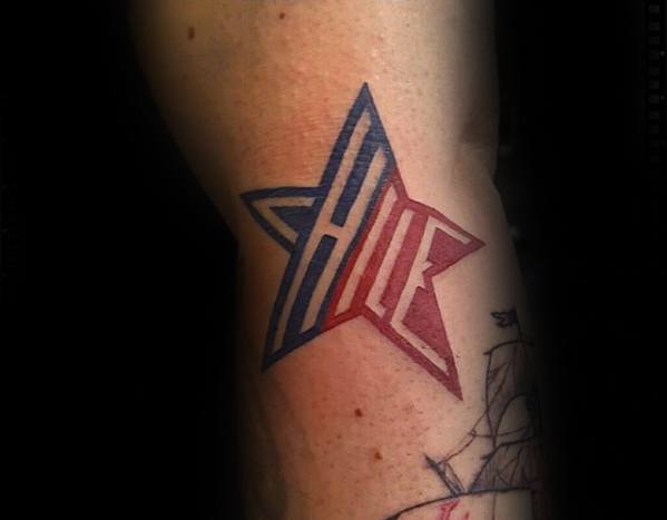 negative-space-lettering-guys-red-and-blue-simple-star-arm-tattoo