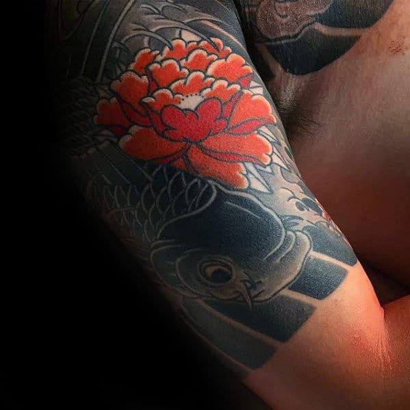 red-japanese-flower-with-koi-fish-mens-quarter-sleeve-tattoo