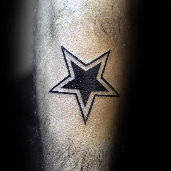 solid-black-ink-and-outline-mens-simple-star-arm-tattoo