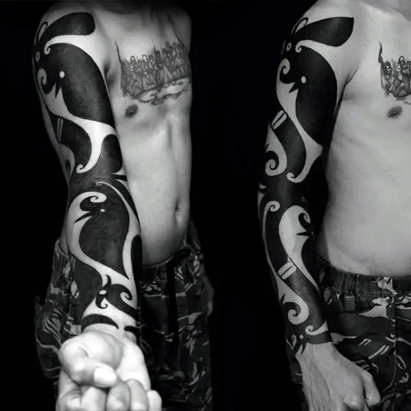 blackwork-full-arm-guys-tattoos-with-badass-tribal-design