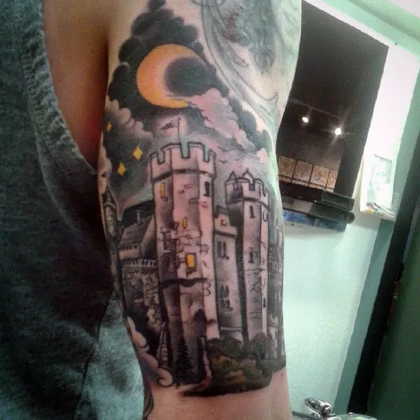 castle-at-night-with-half-moon-mens-half-sleeve-tattoo