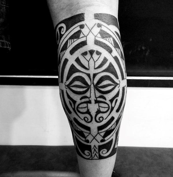 cool-badass-tribal-tattoo-design-ideas-for-male-on-back-of-leg