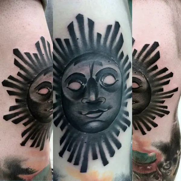 cool-sun-face-tattoo-design-for-men-in-black-ink-on-leg-calf