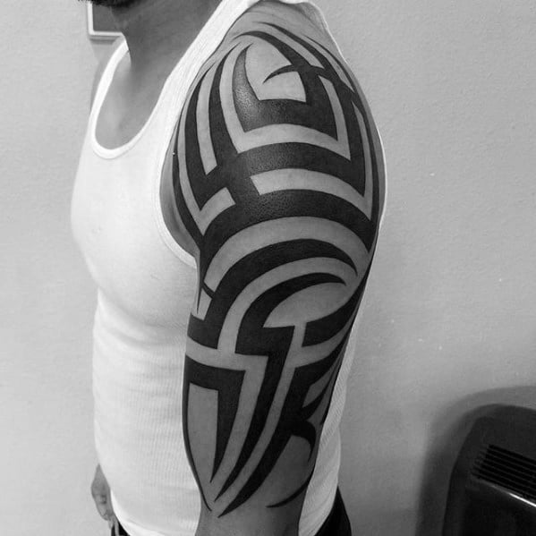 creative-badass-tribal-tattoos-for-men-on-arm