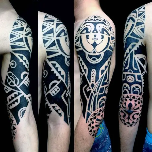 gentleman-with-badass-tribal-tattoo-half-sleeve