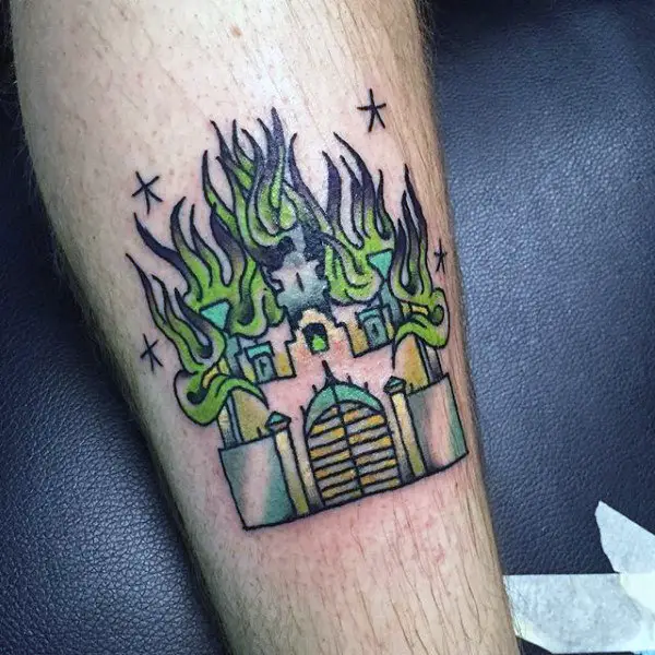 green-flaming-castle-tattoo-for-men-on-arm