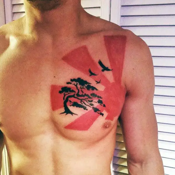 manly-sun-tattoo-designs-for-men-on-chest-in-red-ink