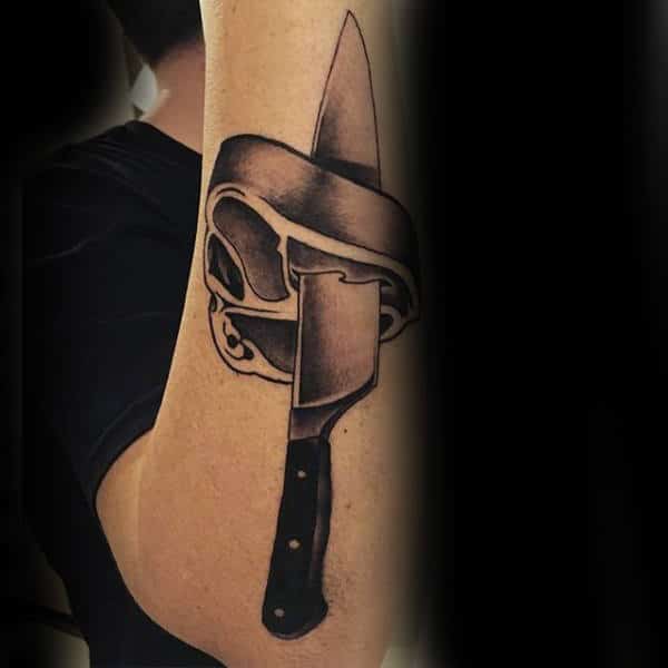 knife-through-bread-culinary-tattoo-male-forearms