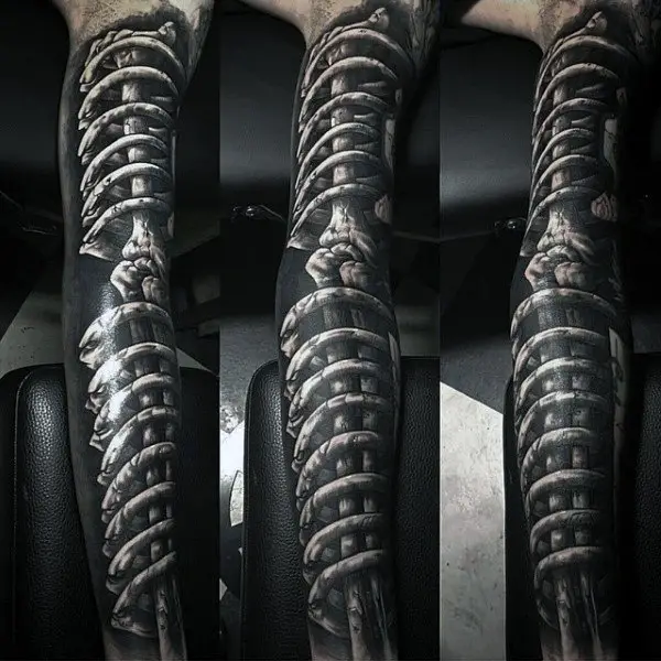 3d-realistic-bone-black-ink-male-tattoo-on-arm