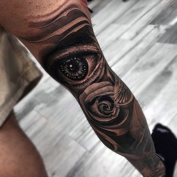 eye-with-rose-mens-leg-tatoto-with-black-ink