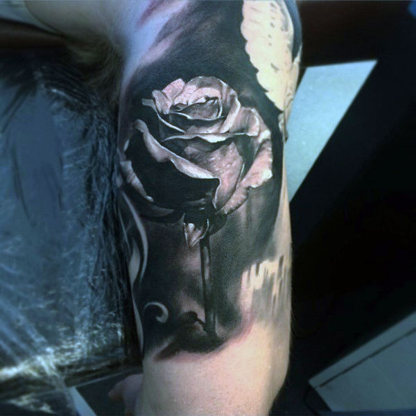 incredible-black-ink-rose-flower-inner-arm-male-tattoo