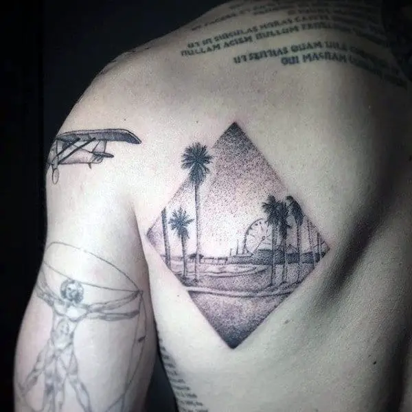 male-back-palm-tress-in-diamond-shaped-stamp-dotwork-tattoo