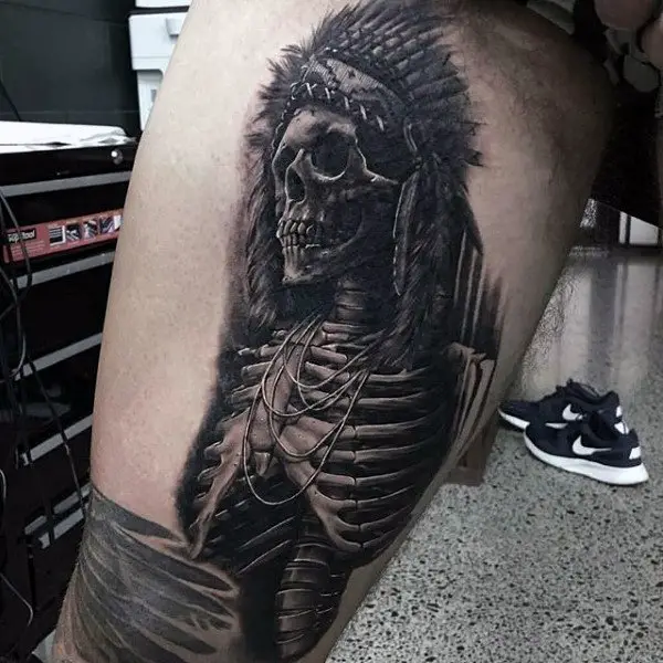 man-with-skeleton-indian-black-ink-thigh-tattoo
