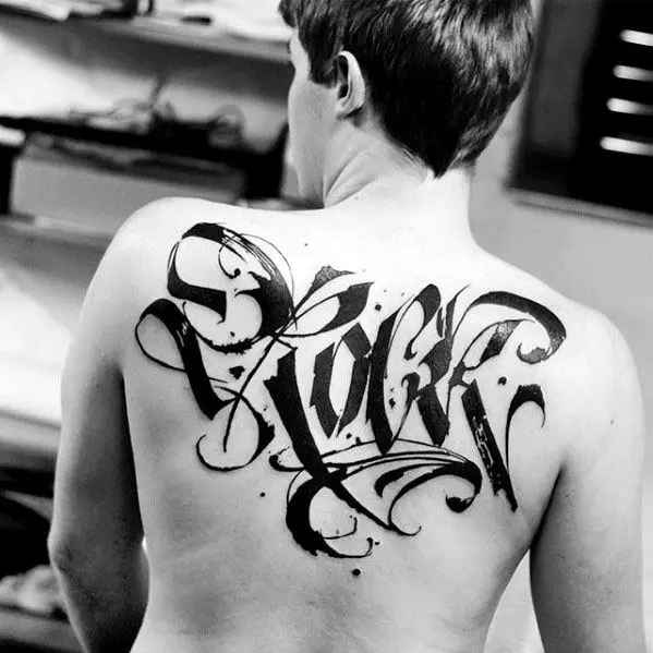 typography-tattoo-ideas-on-guys-on-upper-back