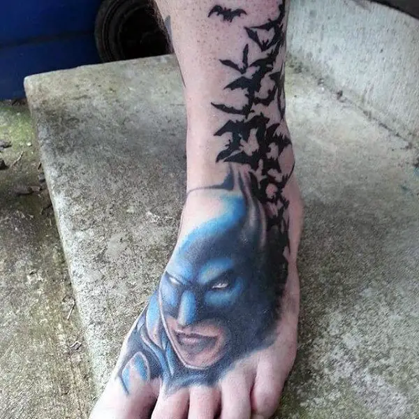 batman-with-flying-black-bats-foot-tattoos-for-men
