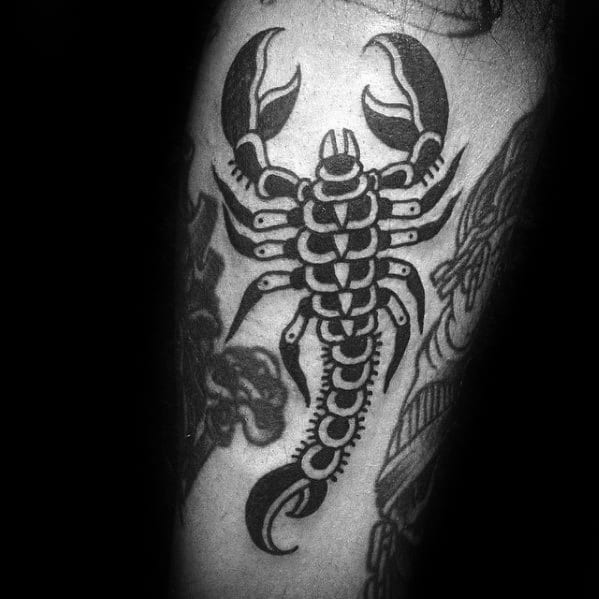 black-ink-outer-arm-male-traditional-scorpion-tattoo