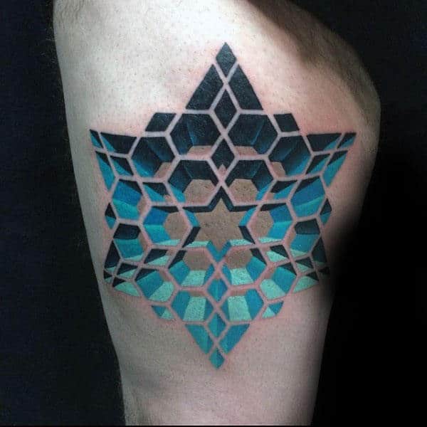 blue-star-optical-illusion-pattern-tattoo-on-mans-thigh