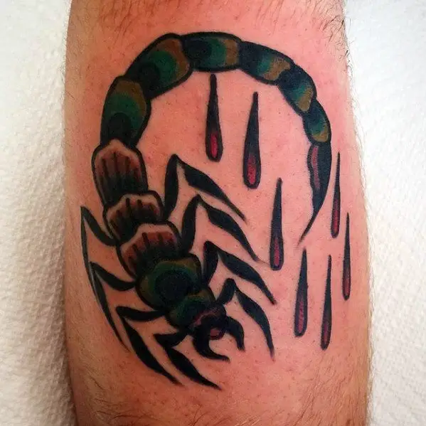 green-and-black-traditional-scorpion-blood-mens-arm-tattoo