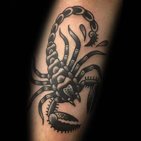 guy-with-shaded-black-and-grey-tattoo-of-traditional-scorpion-on-arm